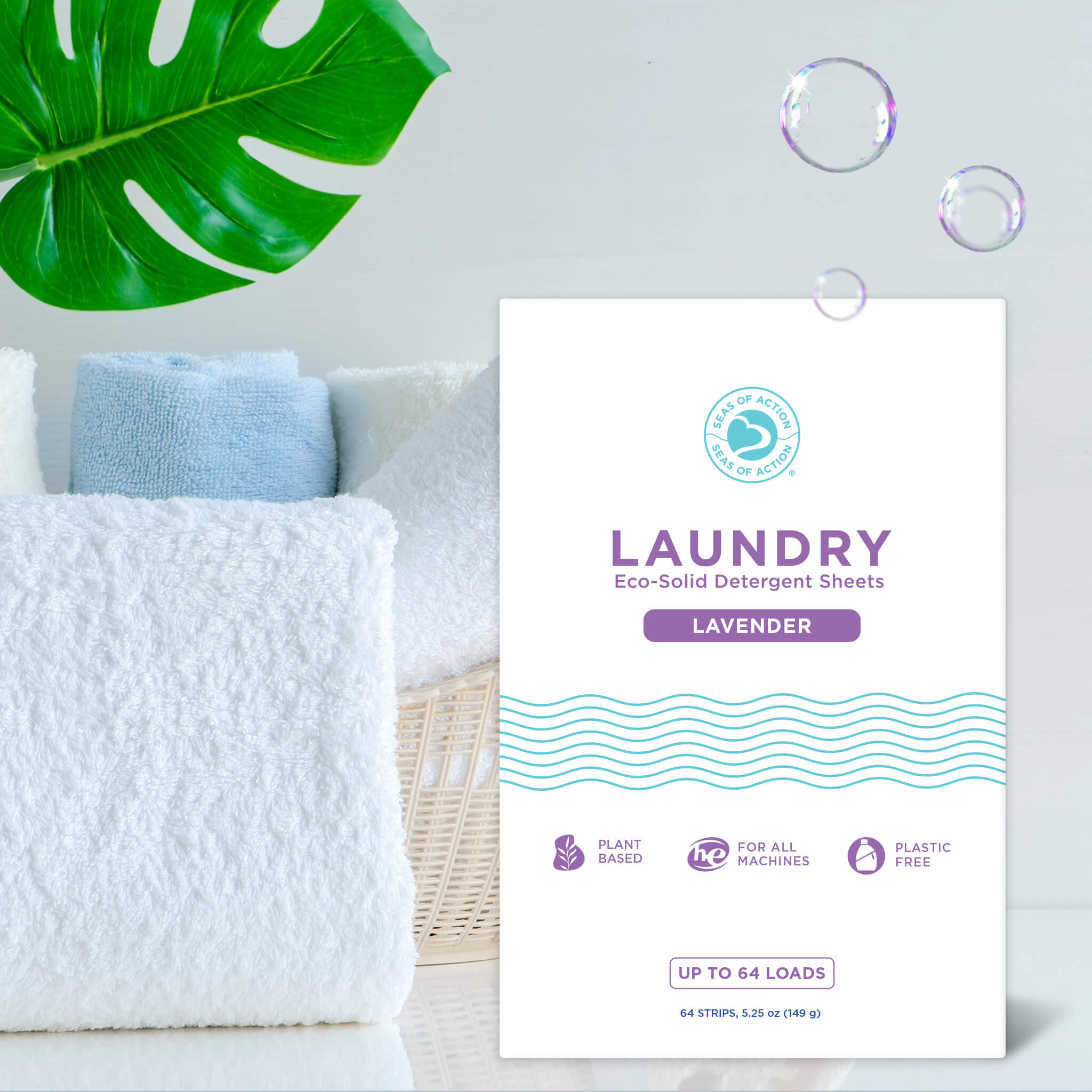 basket filled with neatly folded towels beside a pack of eco-friendly laundry detergent sheets, with a green leaf adding a natural touch in the background.